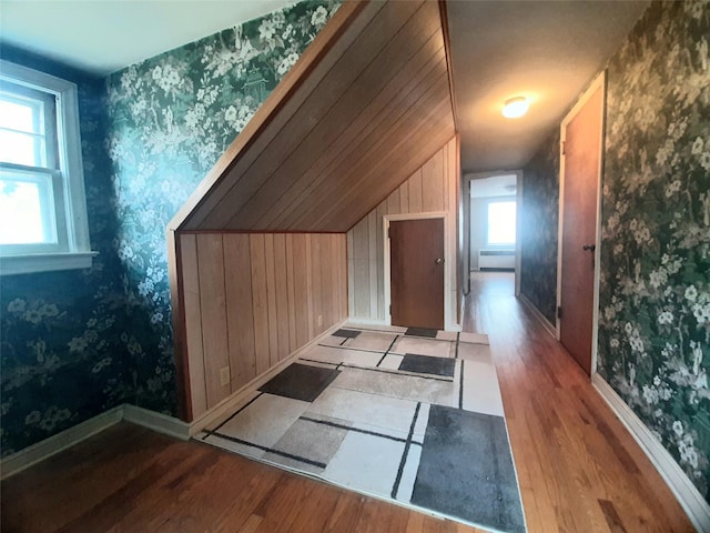 52 Fountain Pl, Poughkeepsie, NY 12603 - bonus room with wood finished floors, lofted ceiling, wallpapered walls, and healthy amount of natural light
