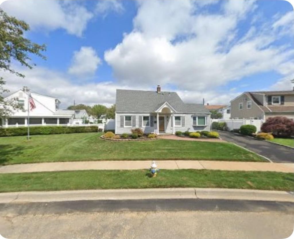 3 Appletree Ln, Levittown, NY 11756 - view of front of home featuring driveway