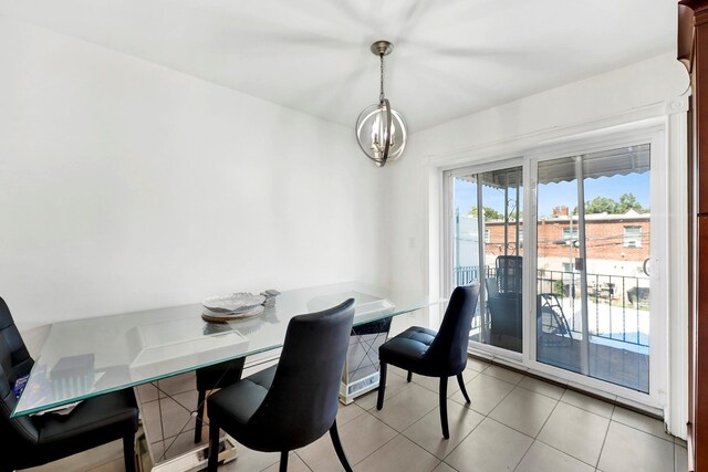 946 Balcom Ave, Bronx, NY 10465 - dining area featuring a chandelier and light tile patterned floors