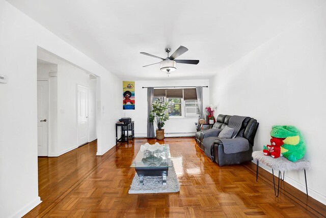 946 Balcom Ave, Bronx, NY 10465 - living room with baseboards and a ceiling fan