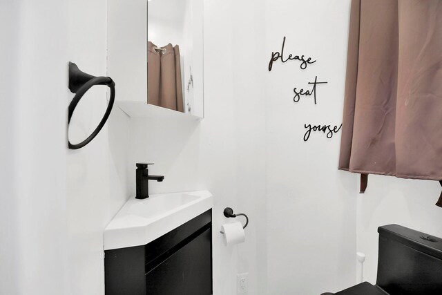 946 Balcom Ave, Bronx, NY 10465 - bathroom featuring toilet and vanity