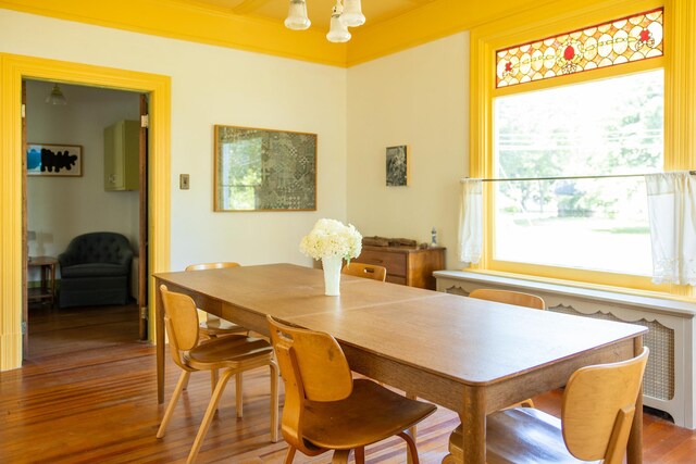 7432 S Broadway, Red Hook, NY 12571 - dining area featuring healthy amount of natural light, wood finished floors, and a chandelier