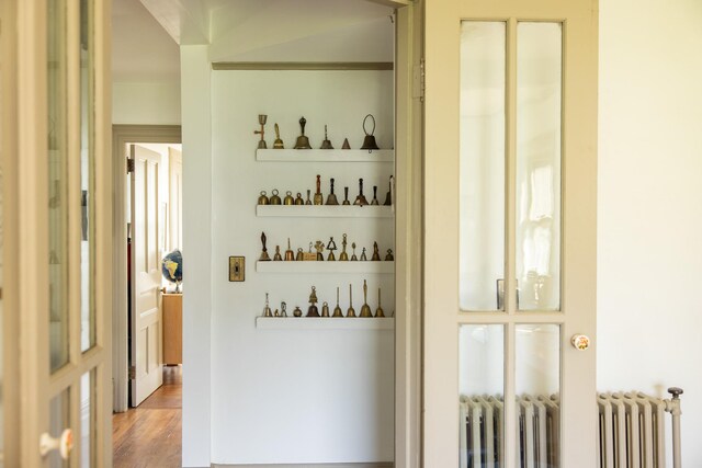 7432 S Broadway, Red Hook, NY 12571 - detailed view of radiator heating unit and wood finished floors