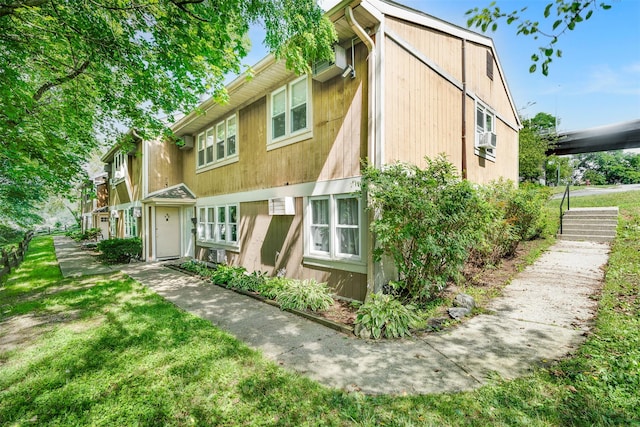 68 Gerald Dr Unit D1, Poughkeepsie, NY 12601 - back of house featuring a lawn