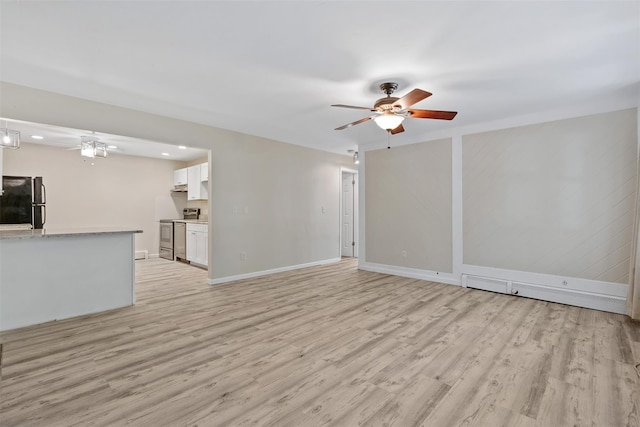 68 Gerald Dr Unit D1, Poughkeepsie, NY 12601 - unfurnished living room with ceiling fan, light wood-type flooring, and recessed lighting