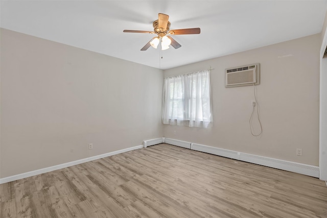 68 Gerald Dr Unit D1, Poughkeepsie, NY 12601 - unfurnished room featuring an AC wall unit, baseboard heating, wood finished floors, and a ceiling fan