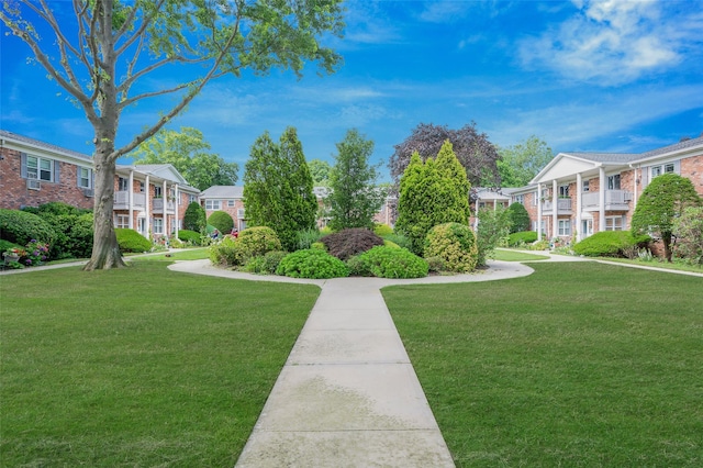 54 Fairharbor Dr Unit 54, Patchogue, NY 11772 - surrounding community featuring a lawn