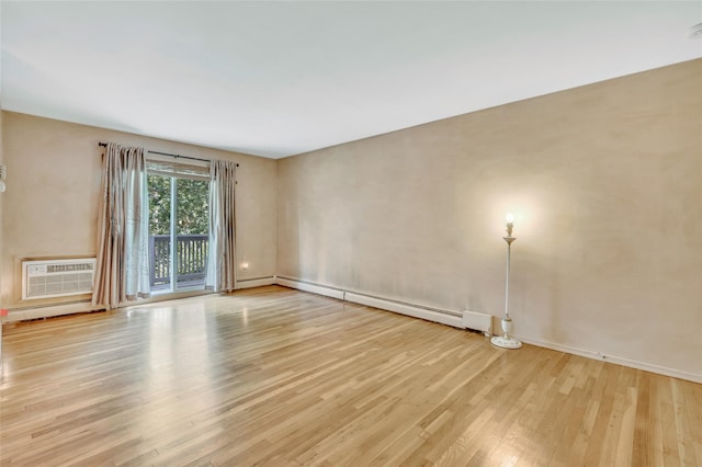 54 Fairharbor Dr Unit 54, Patchogue, NY 11772 - unfurnished room featuring wood finished floors, a baseboard radiator, and an AC wall unit