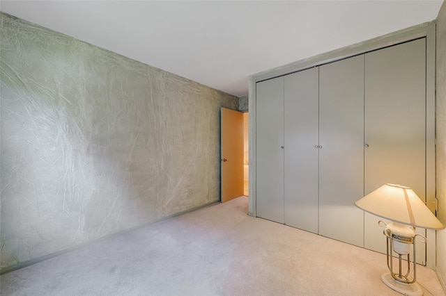 54 Fairharbor Dr Unit 54, Patchogue, NY 11772 - unfurnished bedroom with carpet flooring and a closet