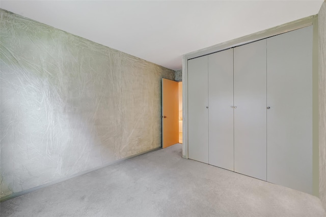 54 Fairharbor Dr Unit 54, Patchogue, NY 11772 - unfurnished bedroom featuring carpet flooring and a closet