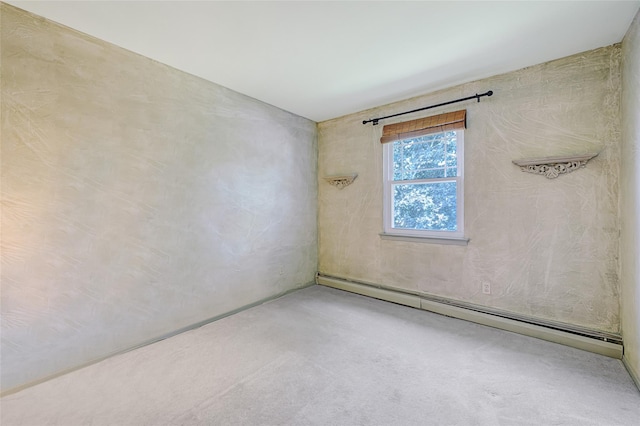 54 Fairharbor Dr Unit 54, Patchogue, NY 11772 - spare room with baseboard heating and carpet floors