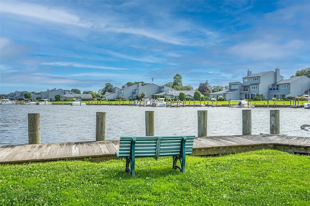54 Fairharbor Dr Unit 54, Patchogue, NY 11772 - dock featuring a residential view and a water view