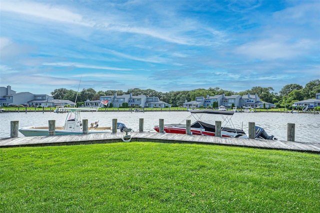 54 Fairharbor Dr Unit 54, Patchogue, NY 11772 - dock area with a lawn, a water view, and a residential view