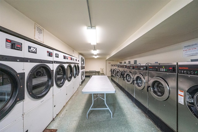 54 Fairharbor Dr Unit 54, Patchogue, NY 11772 - community laundry with washing machine and clothes dryer and tile patterned floors