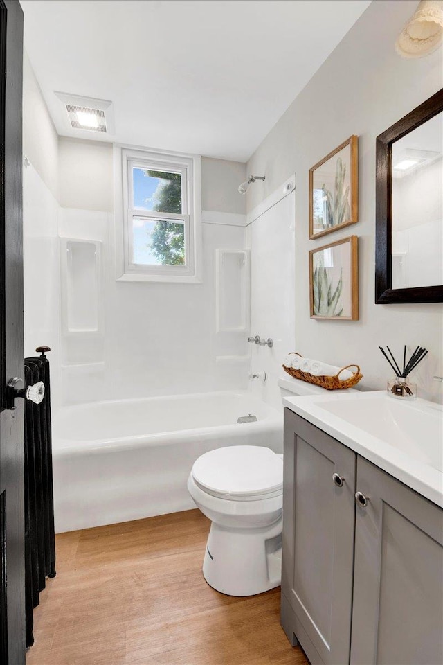 4 Cedar St, Hastings-On-Hudson, NY 10706 - full bath featuring vanity, wood finished floors, and tub / shower combination