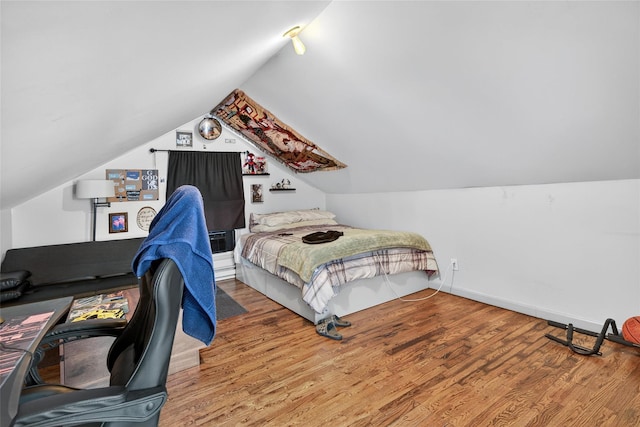33 E Main St, Blooming Grove, NY 10992 - bedroom with lofted ceiling, wood finished floors, and a desk