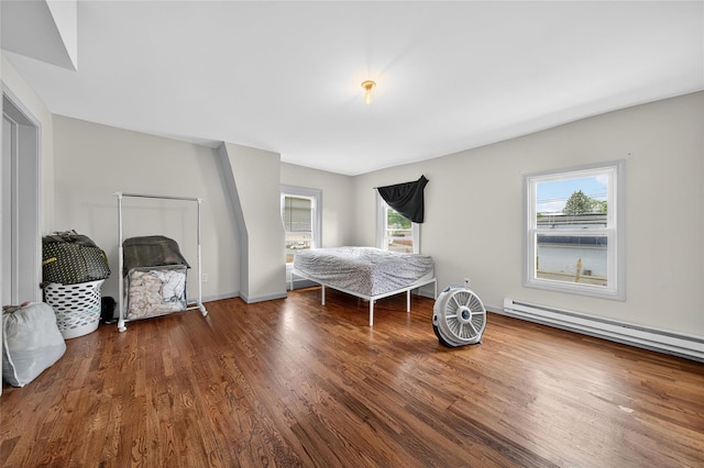 33 E Main St, Blooming Grove, NY 10992 - bedroom with wood finished floors and a baseboard radiator