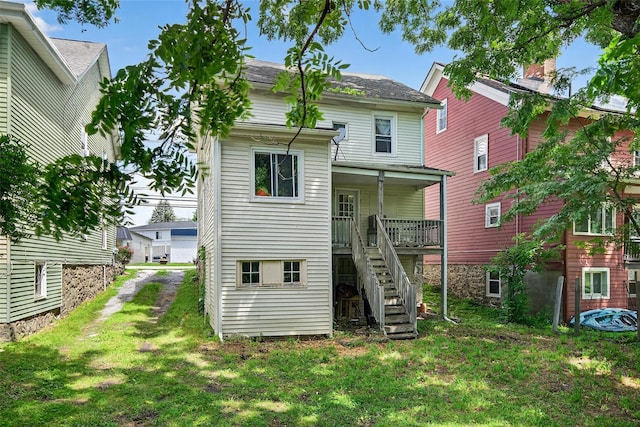 33 E Main St, Blooming Grove, NY 10992 - rear view of property featuring stairway and a yard