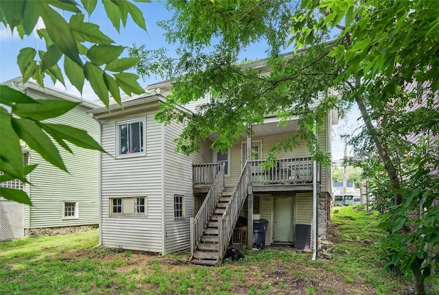 33 E Main St, Blooming Grove, NY 10992 - rear view of house with stairway