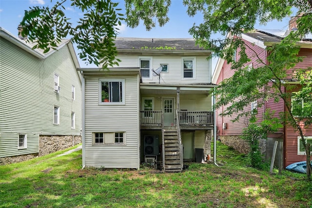 33 E Main St, Blooming Grove, NY 10992 - back of property featuring stairway and a lawn