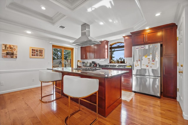 4048 194th St Unit A3, Flushing, NY 11358 - kitchen with freestanding refrigerator, island range hood, ornamental molding, a kitchen island, and a breakfast bar area