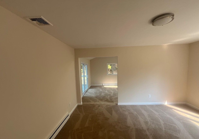 181 Wading River Hollow Rd, Ridge, NY 11961 - carpeted empty room featuring baseboards and baseboard heating