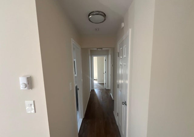 181 Wading River Hollow Rd, Ridge, NY 11961 - hallway with dark wood-type flooring and baseboards