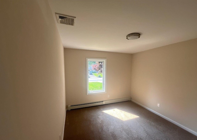 181 Wading River Hollow Rd, Ridge, NY 11961 - carpeted spare room featuring a baseboard radiator and baseboards