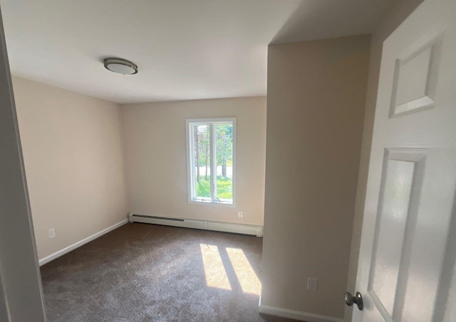 181 Wading River Hollow Rd, Ridge, NY 11961 - carpeted empty room with a baseboard heating unit and baseboards