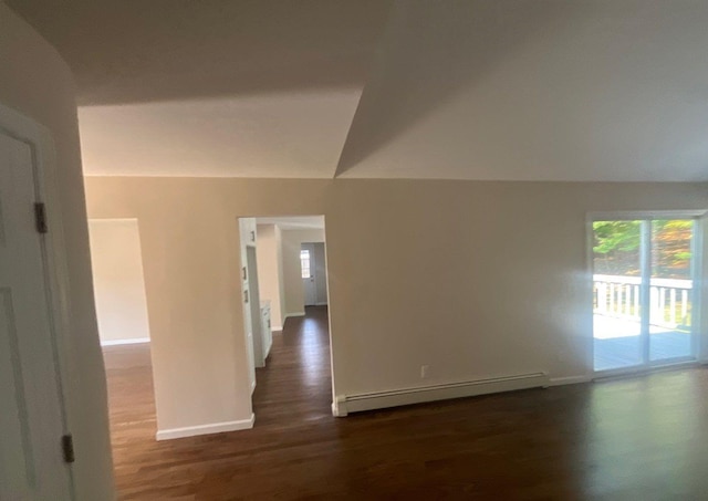 181 Wading River Hollow Rd, Ridge, NY 11961 - empty room with a baseboard radiator and dark wood-style floors