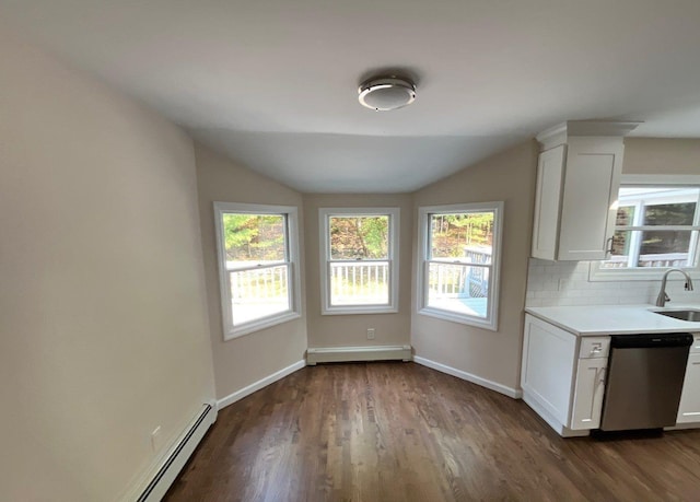 181 Wading River Hollow Rd, Ridge, NY 11961 - kitchen featuring stainless steel dishwasher, a baseboard heating unit, vaulted ceiling, dark wood finished floors, and light countertops