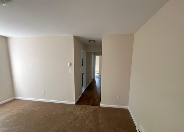 181 Wading River Hollow Rd, Ridge, NY 11961 - unfurnished room with baseboards and carpet floors