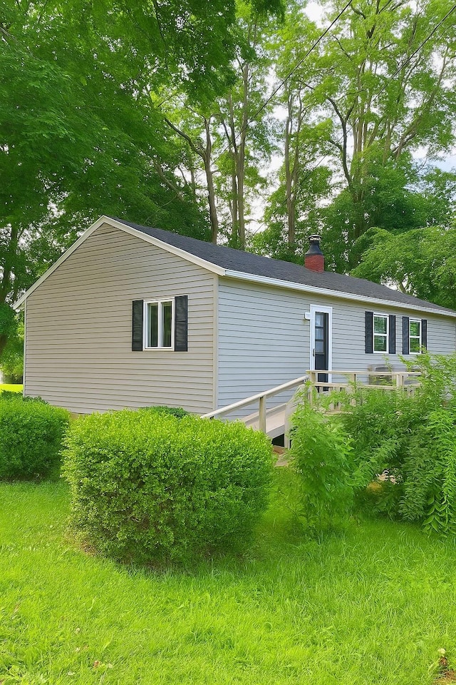 37 Simmons, Millerton, NY 12546 - view of side of property featuring a chimney