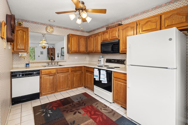 36 Spruce St Unit 36, Pawling, NY 12564 - kitchen with white appliances, light tile patterned floors, and brown cabinetry