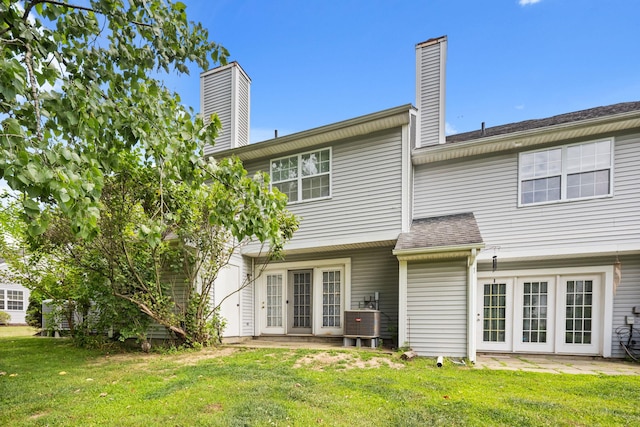 36 Spruce St Unit 36, Pawling, NY 12564 - rear view of property featuring a chimney, a lawn, and roof with shingles