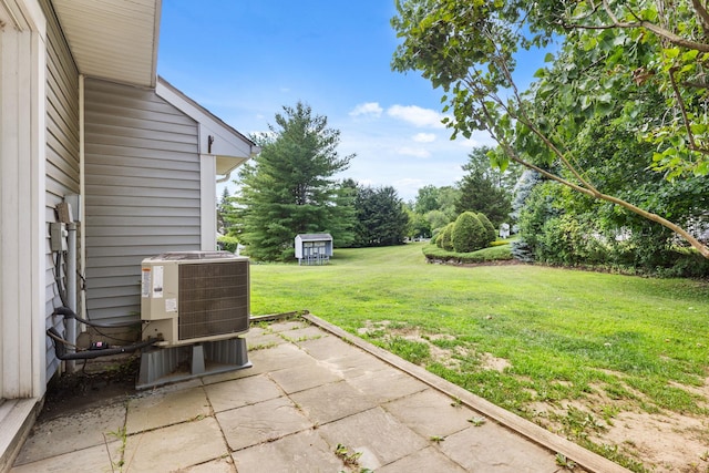 36 Spruce St Unit 36, Pawling, NY 12564 - view of green lawn featuring a patio area and view of scattered trees