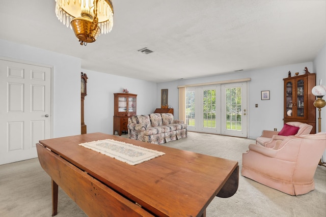 36 Spruce St Unit 36, Pawling, NY 12564 - living area with light colored carpet and a chandelier