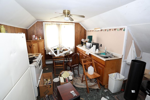 11620 State Route 97, Long Eddy, NY 12760 - kitchen with freestanding refrigerator, lofted ceiling, brown cabinets, light countertops, and a ceiling fan