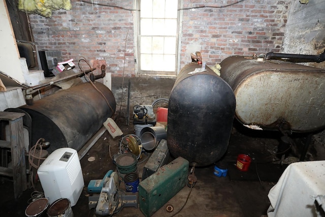 11620 State Route 97, Long Eddy, NY 12760 - miscellaneous room with heating fuel and brick wall