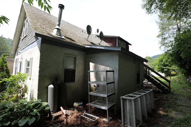 11620 State Route 97, Long Eddy, NY 12760 - view of home's exterior with stairs and roof with shingles