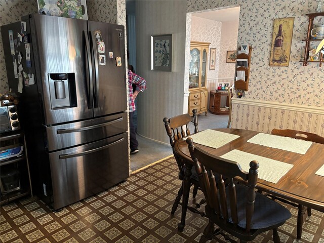 557 Southside Ave, Freeport, NY 11520 - dining area featuring wallpapered walls and tile patterned floors