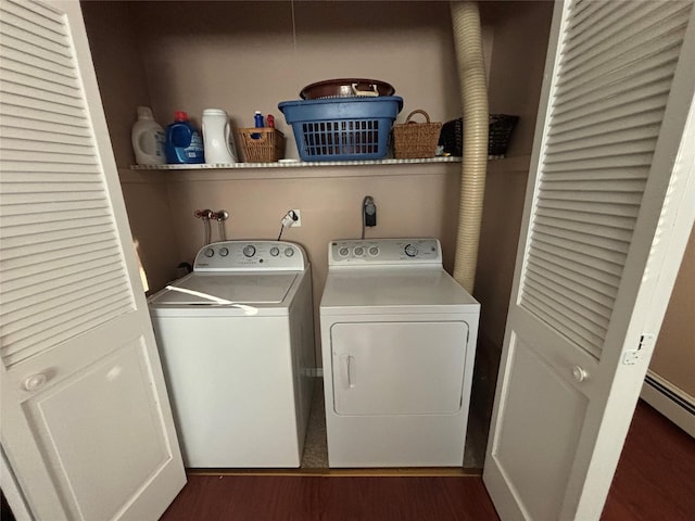 557 Southside Ave, Freeport, NY 11520 - washroom with independent washer and dryer, wood finished floors, and a baseboard heating unit