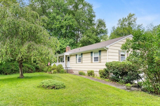 15 Glen Dr, South Salem, NY 10590 - single story home with a front yard and a chimney