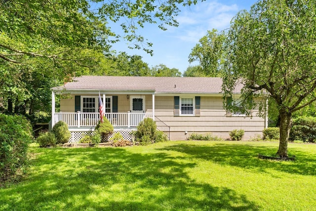 15 Glen Dr, South Salem, NY 10590 - ranch-style home with a porch, a front yard, and a shingled roof