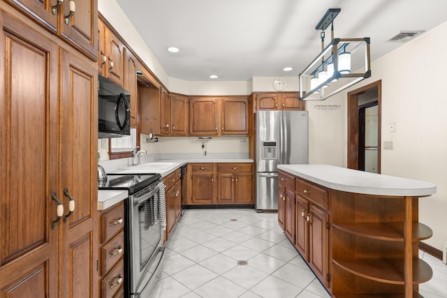 15 Glen Dr, South Salem, NY 10590 - kitchen with stainless steel appliances, brown cabinets, light countertops, open shelves, and a center island