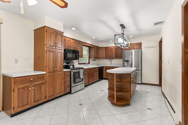 15 Glen Dr, South Salem, NY 10590 - kitchen with black appliances, a baseboard heating unit, open shelves, light countertops, and recessed lighting