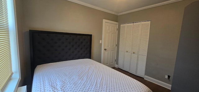 150-10 71st Ave Unit 2G, Kew Garden Hills, NY 11367 - bedroom with ornamental molding, a closet, and dark wood finished floors