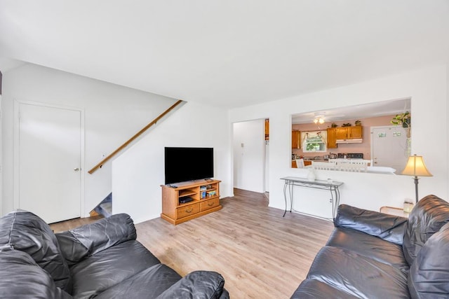 15 Halewood Dr, Shirley, NY 11967 - living room with stairway and light wood finished floors