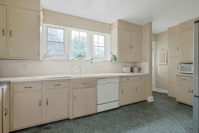 50 Forest Cir, New Rochelle, NY 10804 - kitchen featuring white appliances, light countertops, and cream cabinetry