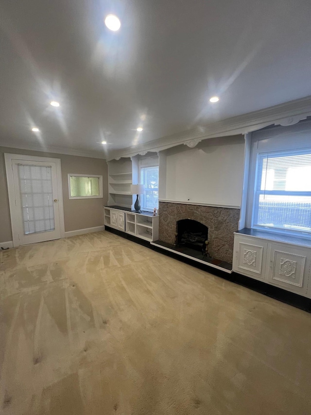 234 S 7th St, Lindenhurst, NY 11757 - unfurnished living room with a fireplace, light colored carpet, healthy amount of natural light, and recessed lighting
